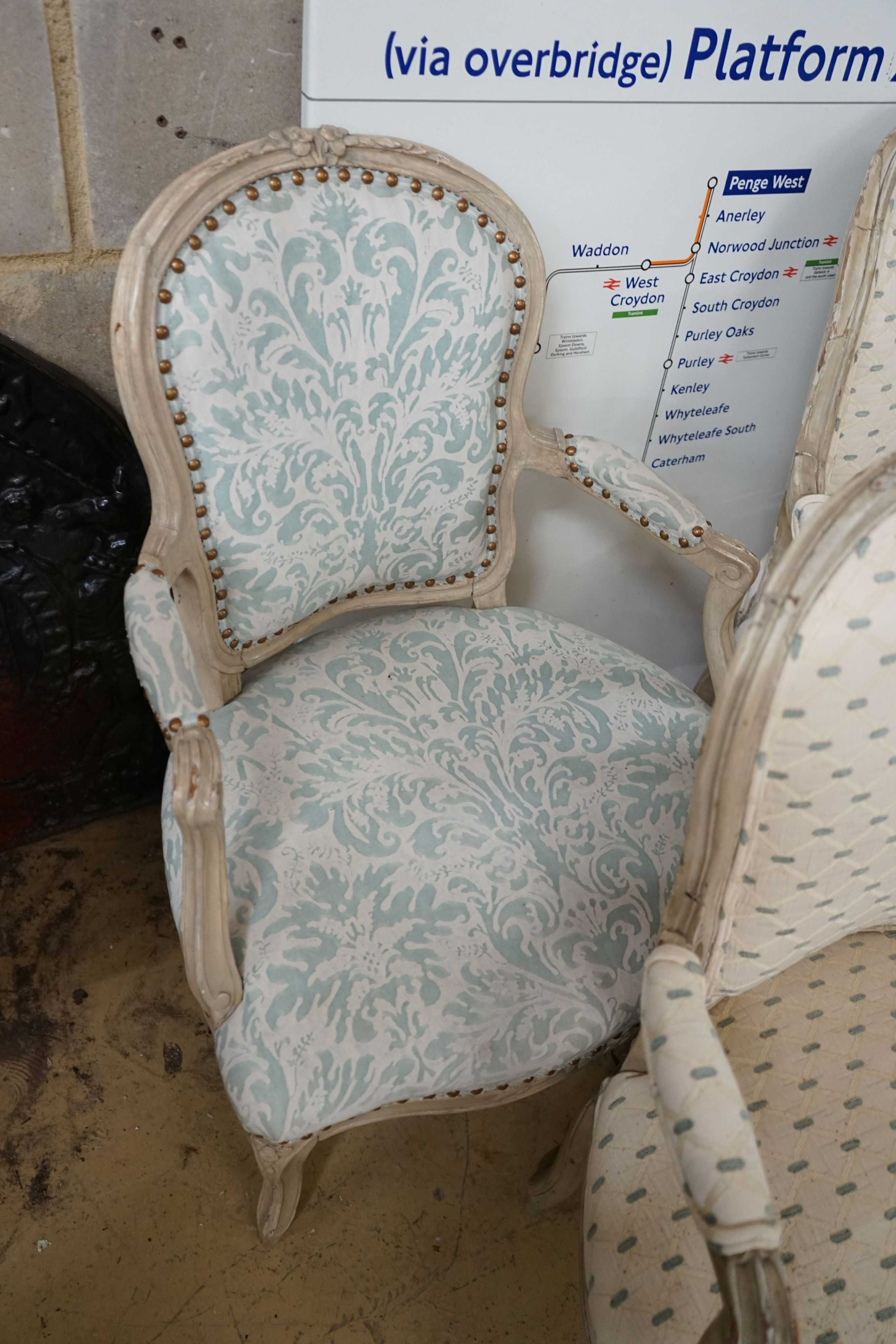 A set of three upholstered French elbow chairs, width 58cm, depth 48cm, height 85cm